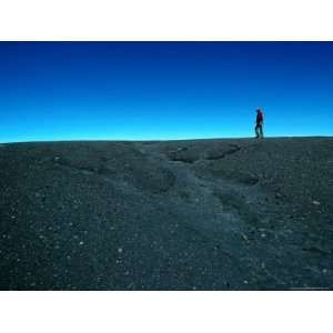 Man Walking on Rim of Irazu Volcano Crater, Against Blue Sky, Cartago 