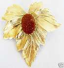 Vintage lovely goldtone leaf pin, sparkly bezel set luc