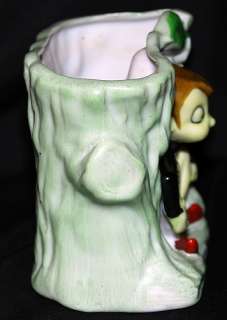 This auction is for a vintage Japan Elf planter. It measures 4 high 
