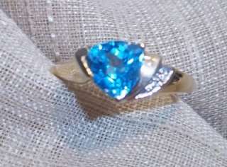 14k yellow gold blue topaz trillion diamond accent ring  