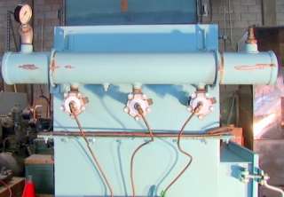 Note the compressed air based solenoid valves that blow down air to 