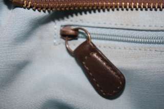 The discoloration of the straps can be seen mostly above the buckle in 