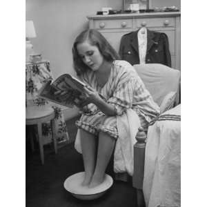  Debutante Ann Lincoln Reading While She Soaks Her Feet 