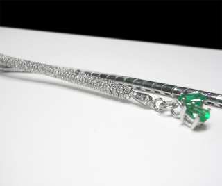   natural intense green emeralds and scintillating diamond s