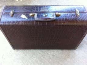   samsonite suitcase at an estate sale outside of dallas texas this