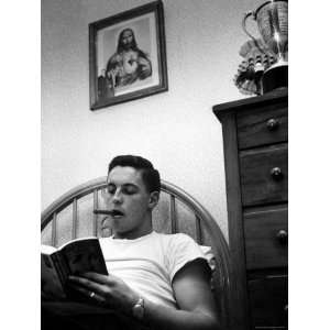Ice Hockey Player Jean Beliveau, Cigar in Mouth, Reading a Book in His 
