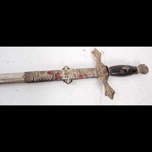 We believe this is a Knights of Columbus sword. It measures 39 end 