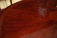 54 Round to Oval Mahogany Dining Table with Leaves  