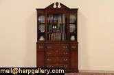   classic breakfront design bookcase or china cabinet has a pull out