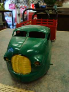  truck here we have a very nice old antique tin toy stake truck forsale