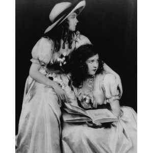 early 1900s photo Dorothy Gish seated, holding book, and Lillian Gish 