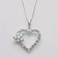 How adorable. This sterling silver necklace features a heart shaped 