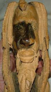 OFFERING A PRINT & VINTAGE WOOD CARVING FROM JAMAICA OF BOB MARLEY 