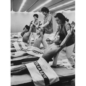  People Getting a Massage at Korakuen in Tokyo Photographic 