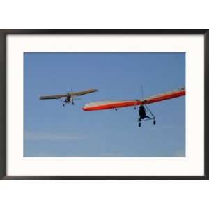  Hang Glider Being Towed Aloft by an Ultralight Aircraft 