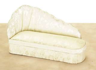 Made of wood, upholstered in cream/white plush fabric with flower 